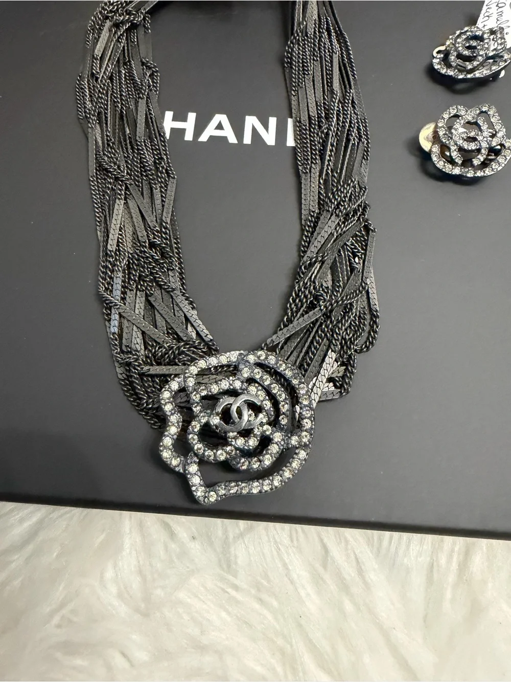 CHANEL Black Multi-Strand Necklace with Crystal Camellia Pendant and Earrings